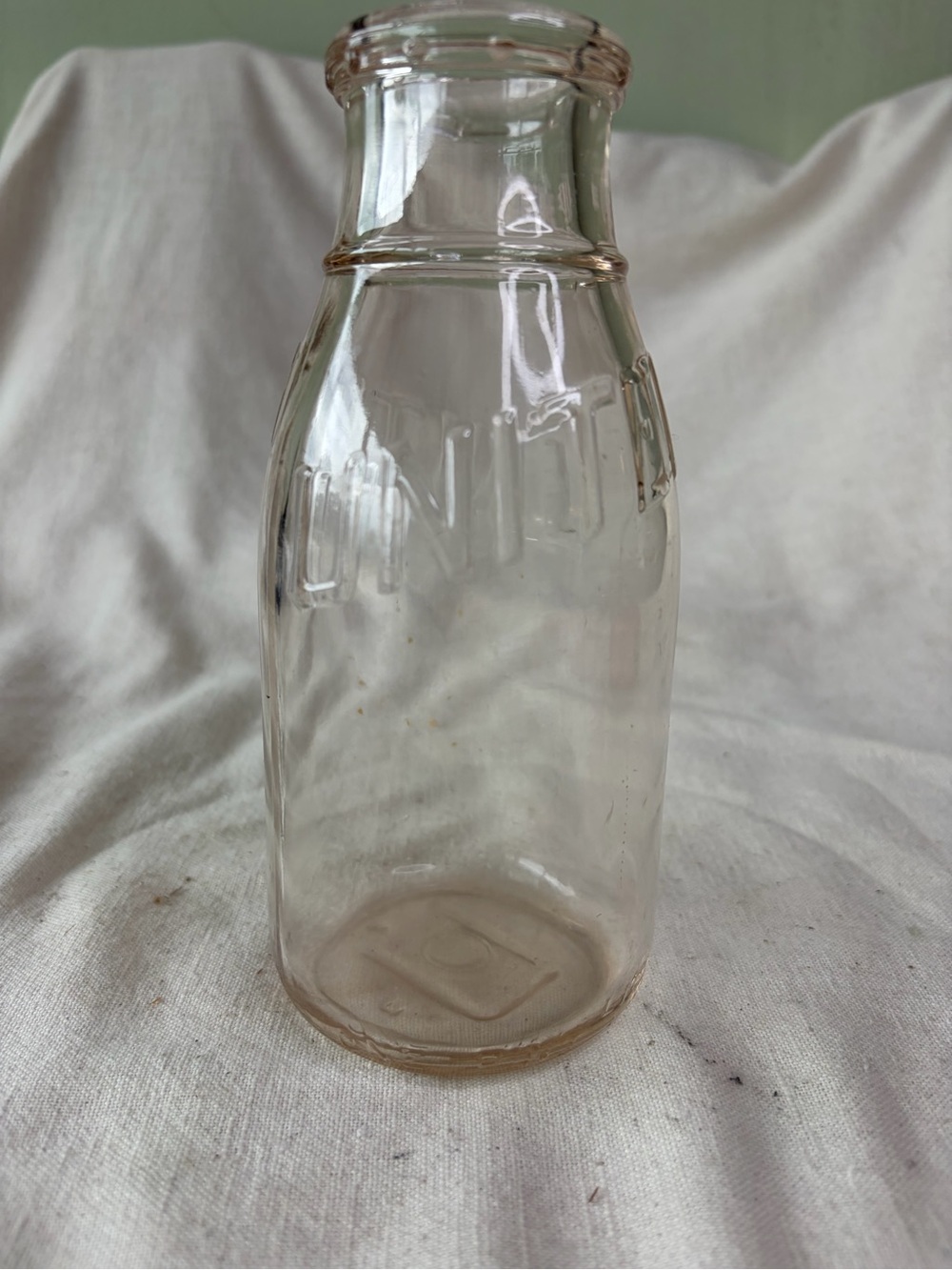 Clear Vintage Milk Bottle - Embossed Glass
